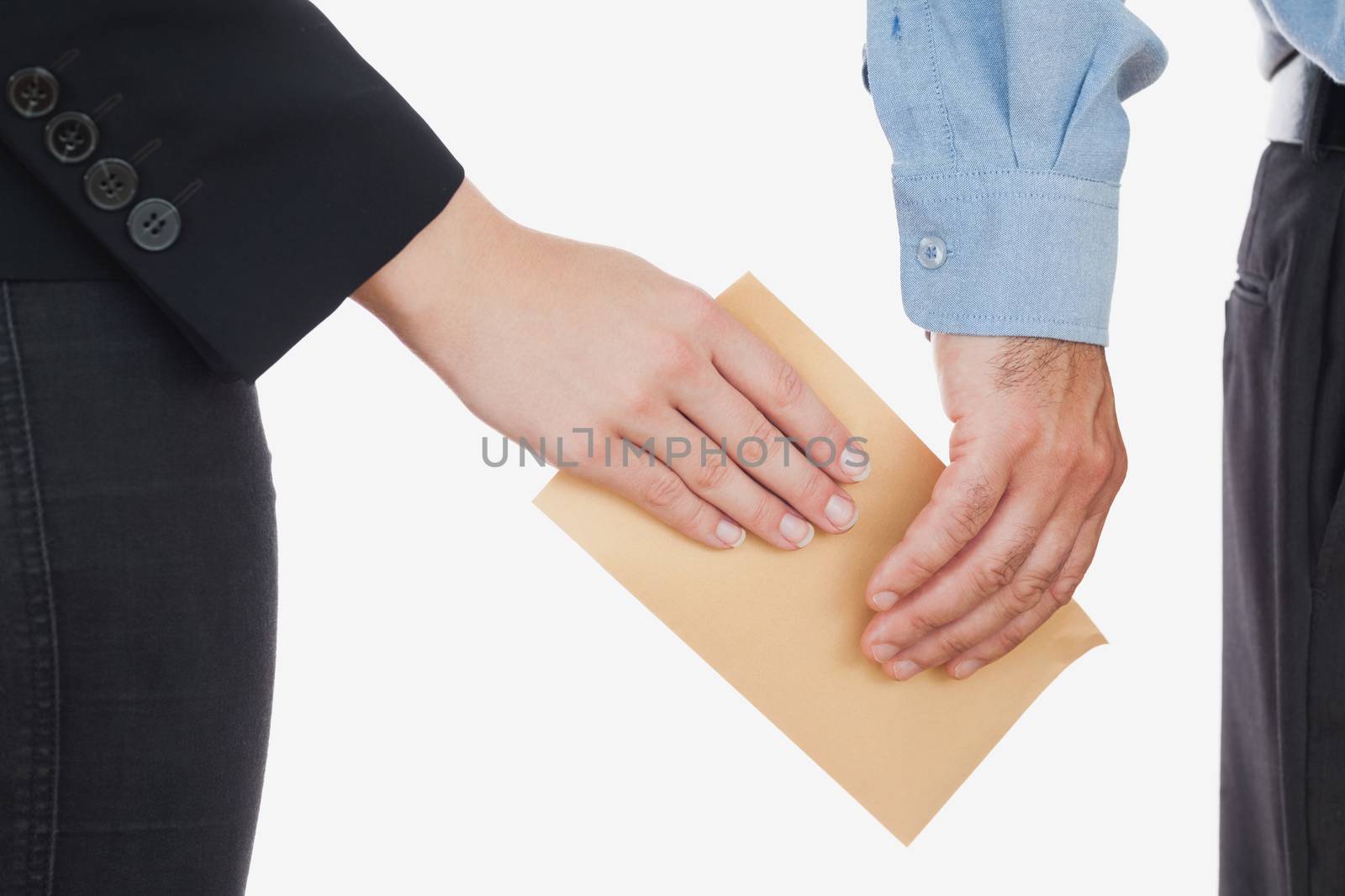 Business people holding an envelope by Wavebreakmedia
