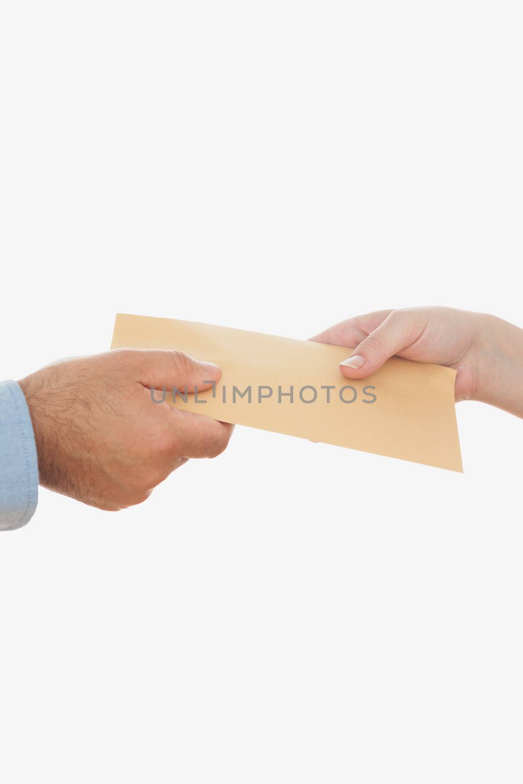 Closeup of business people holding envelope against white background