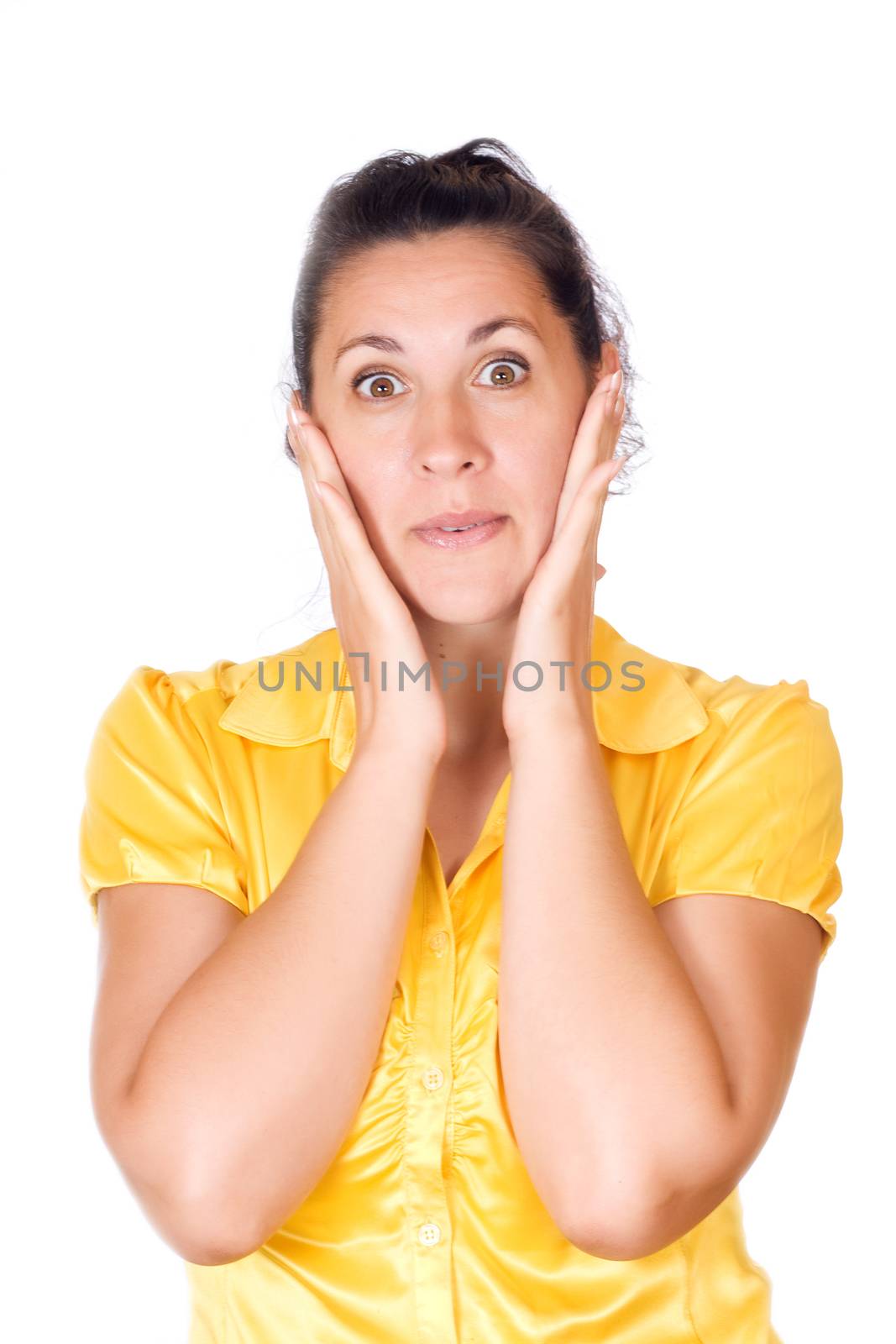 Surprise - A very surprised girl - Close-up of a young woman with wind in her hair looking very surprised.