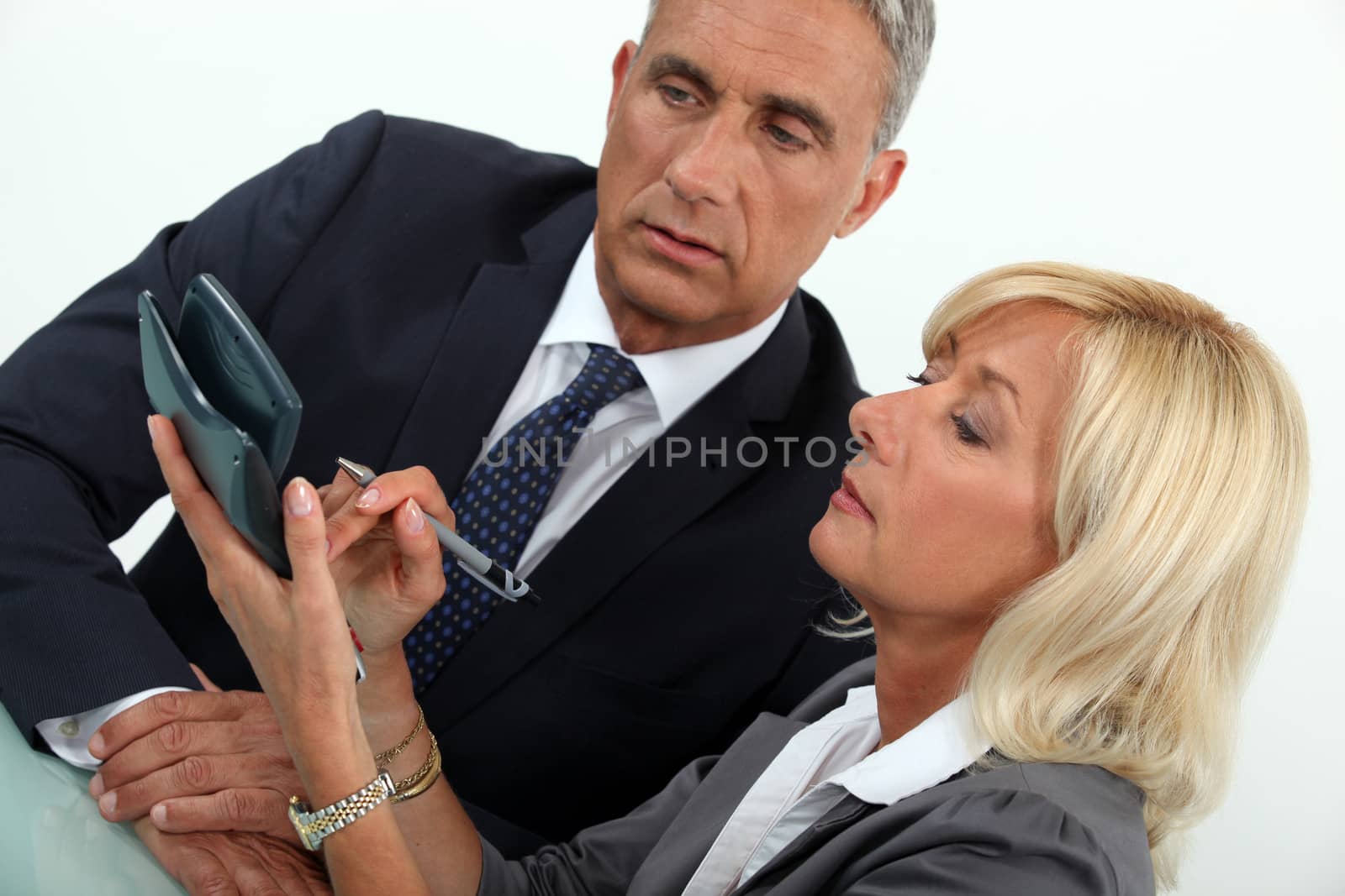middleaged businessman with female counterpart