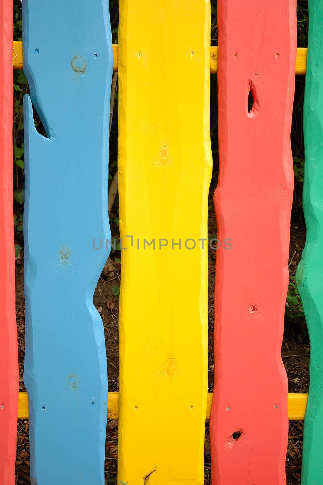Fence made of colorful planks