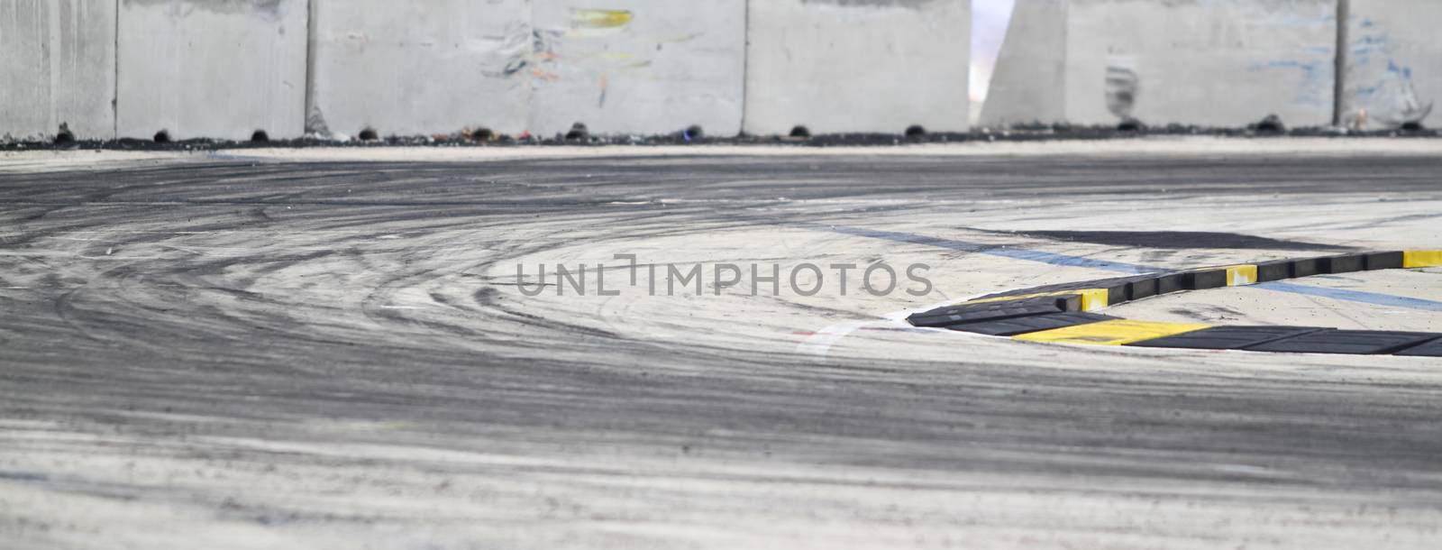 Background with tire marks on road track