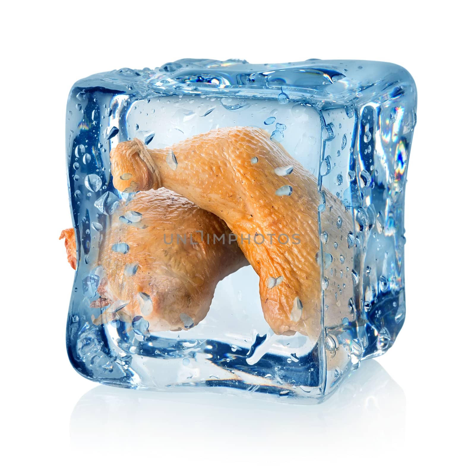 Smoked chicken legs in ice cube isolated on a white background