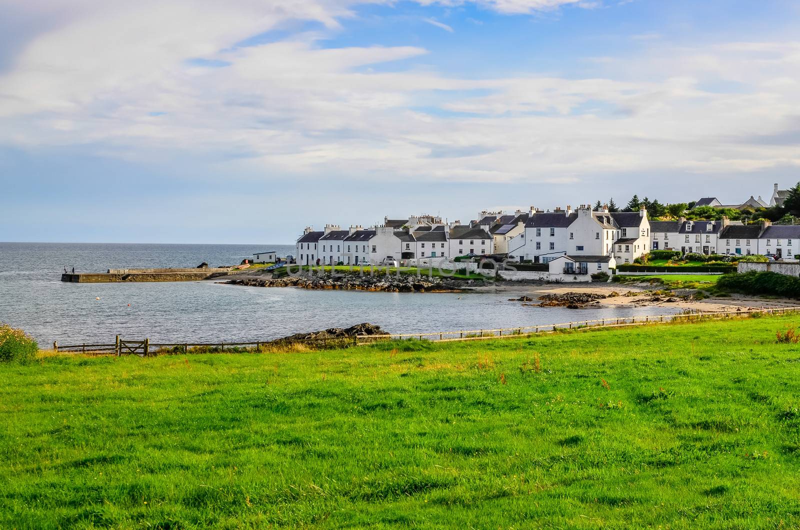 View of harbour and town Port Charlotte on Isle of Islay by martinm303