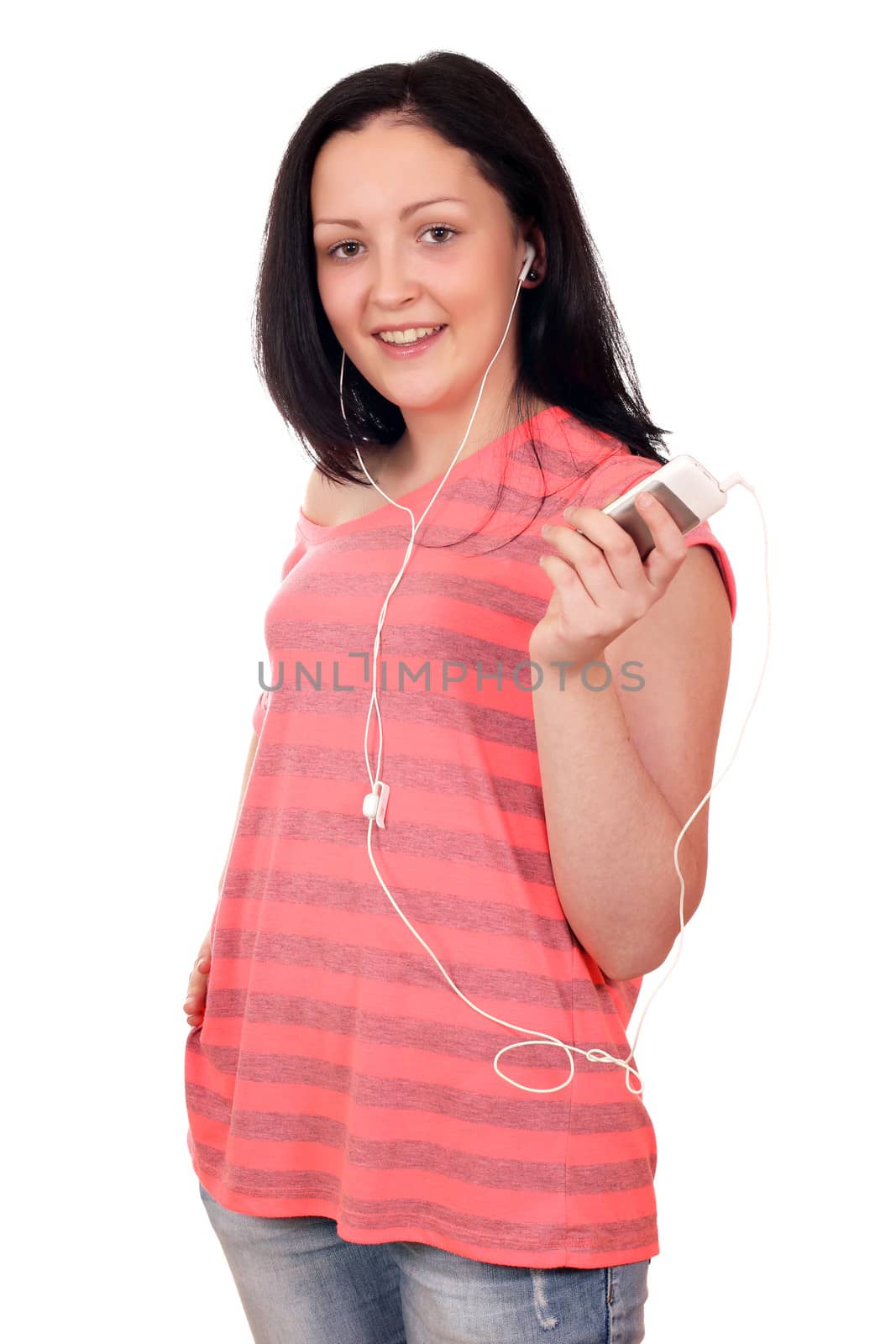beautiful teenage girl listening music on phone