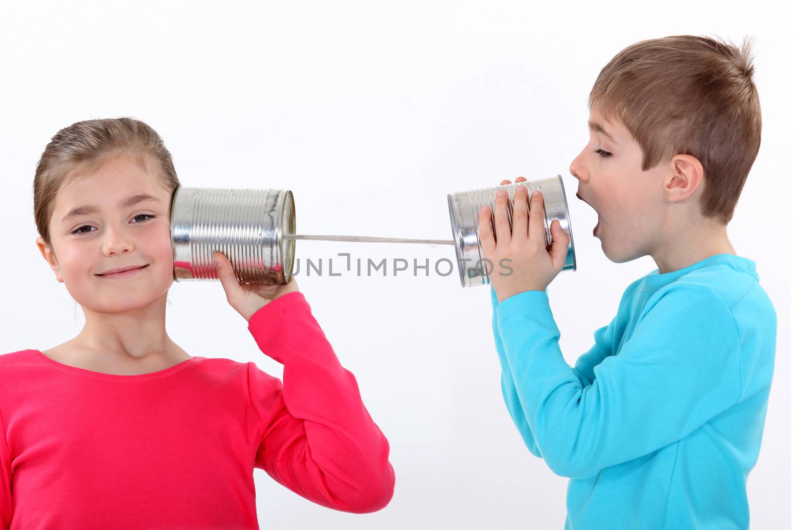 Children communicating with tin cans by phovoir