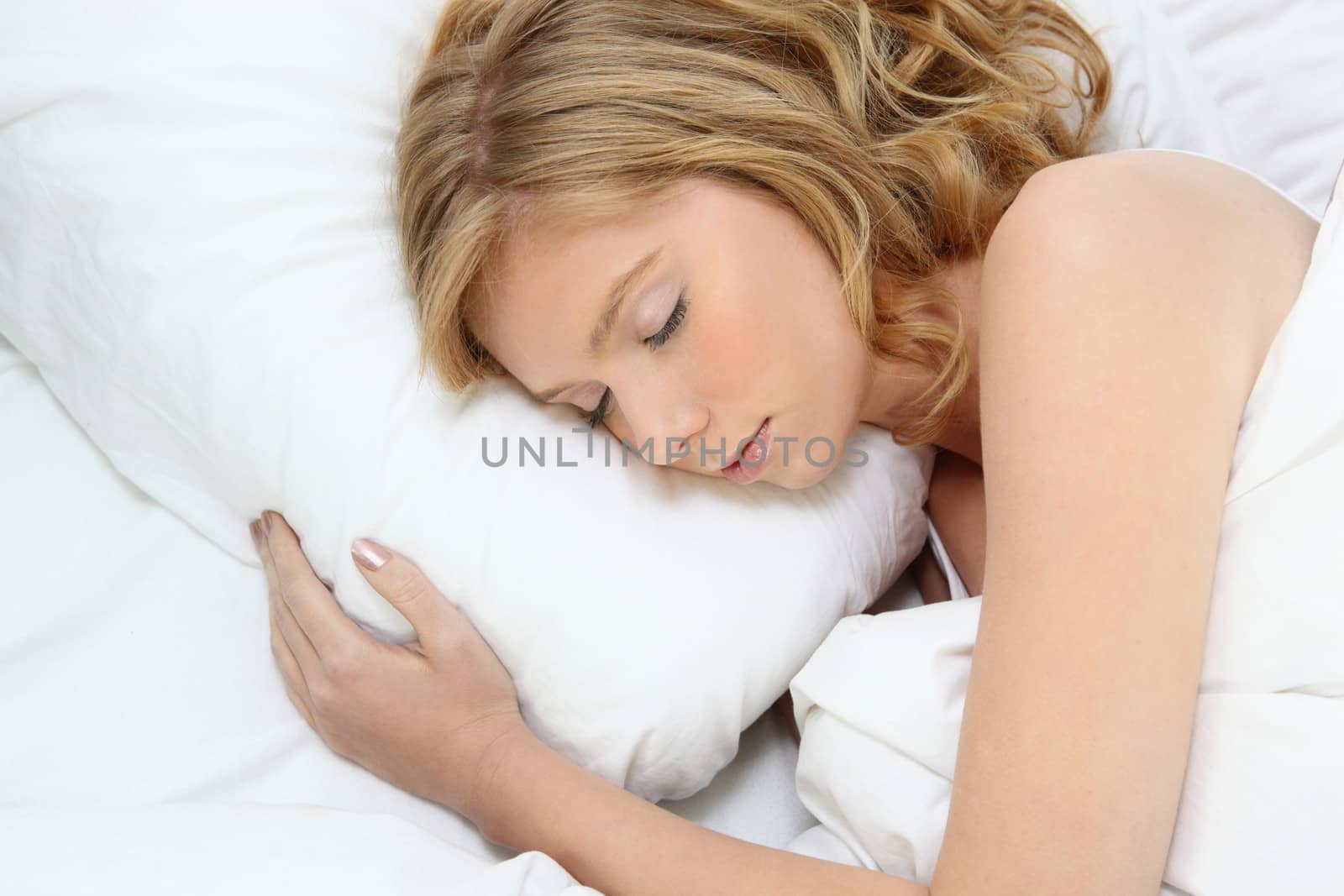 young woman sleeping by phovoir