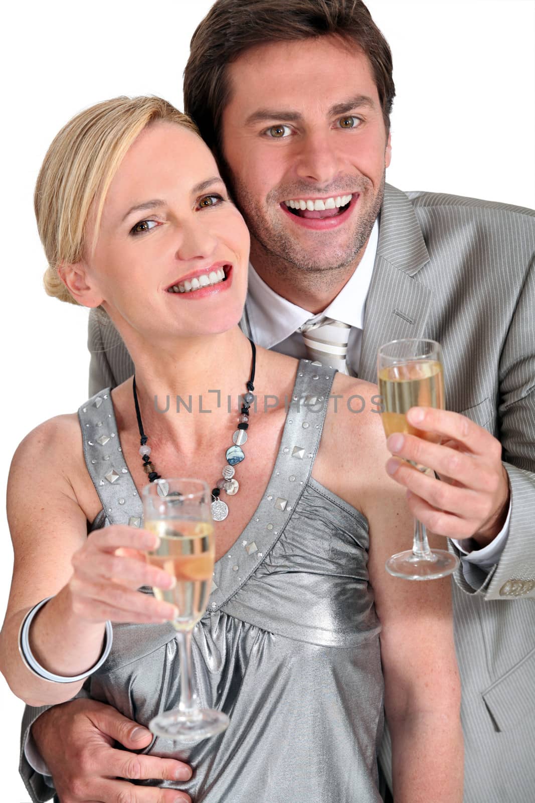 Couple with champagne by phovoir