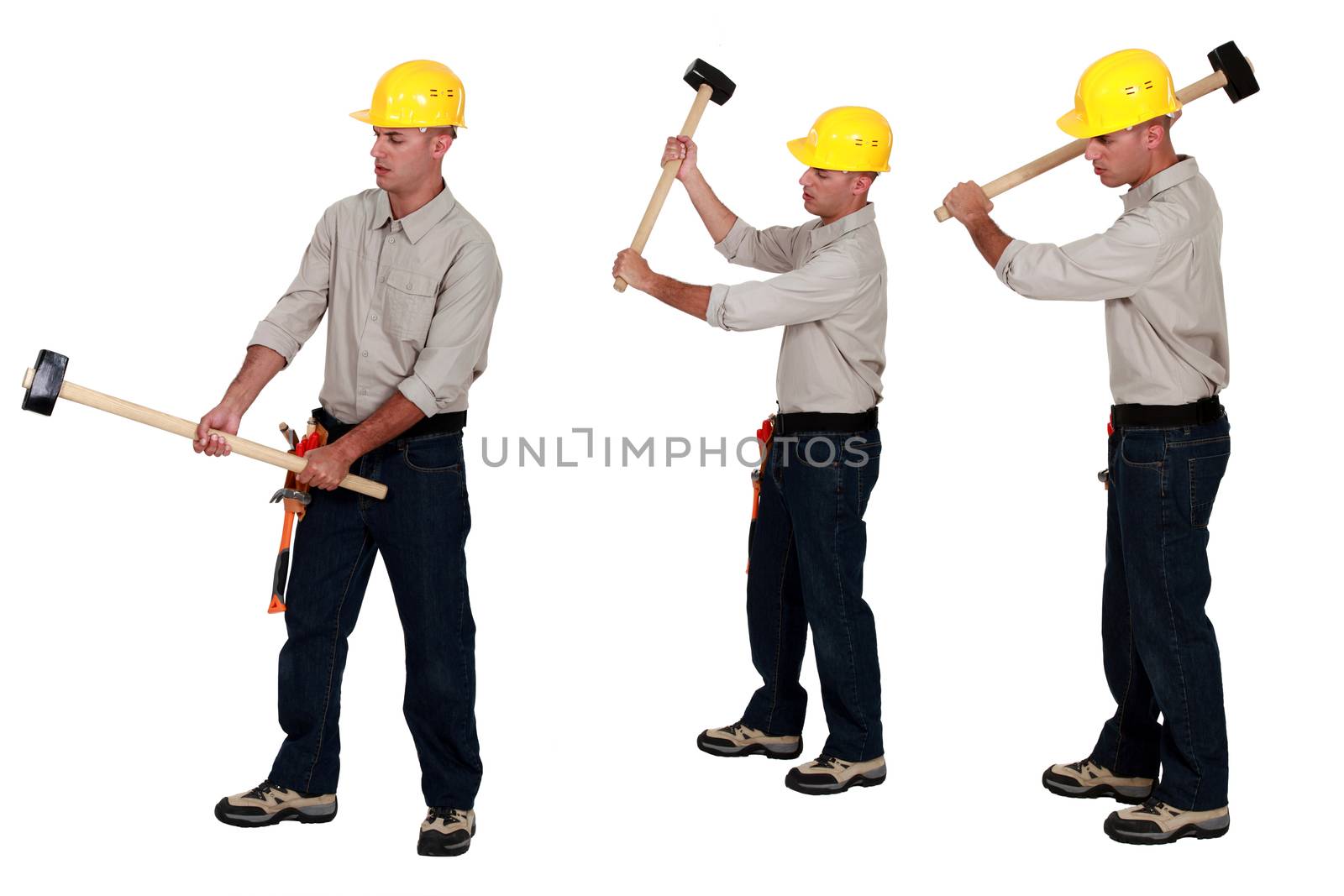 Men holding sledge-hammers