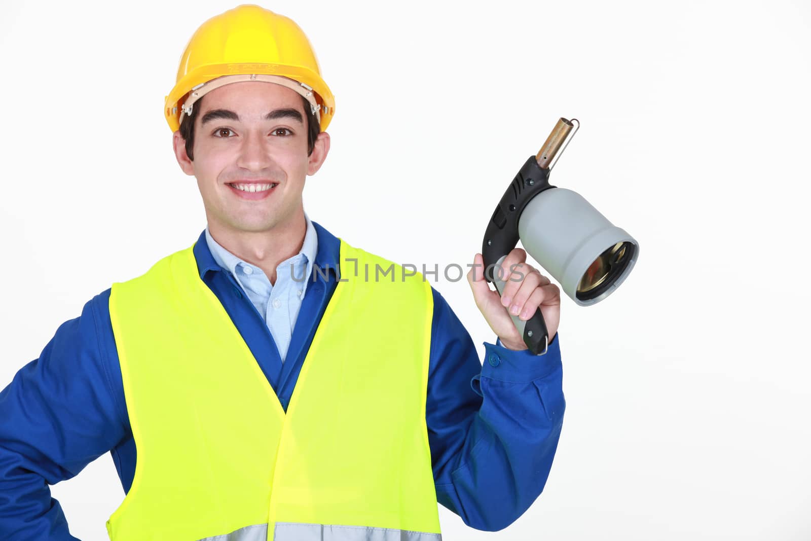 Young worker with blow torch