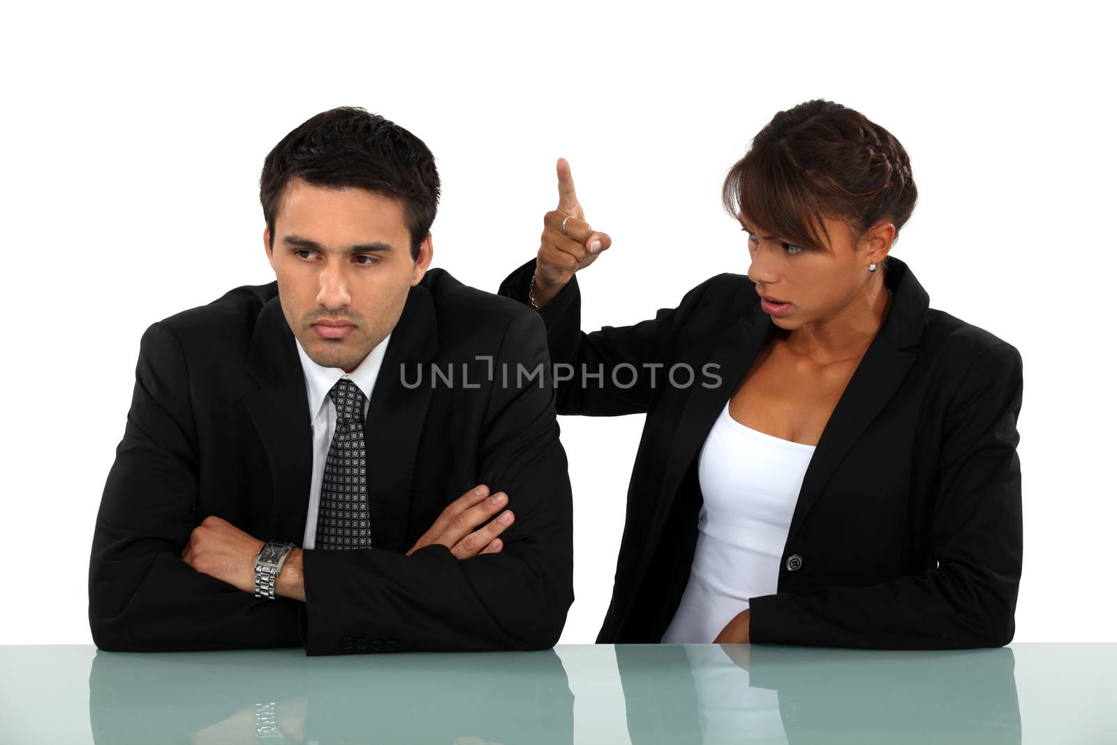 business couple having a quarrel by phovoir