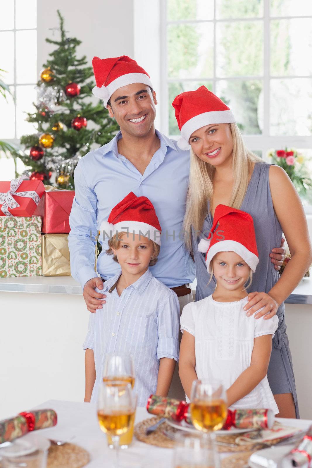 Family christmas portrait at the dinner table