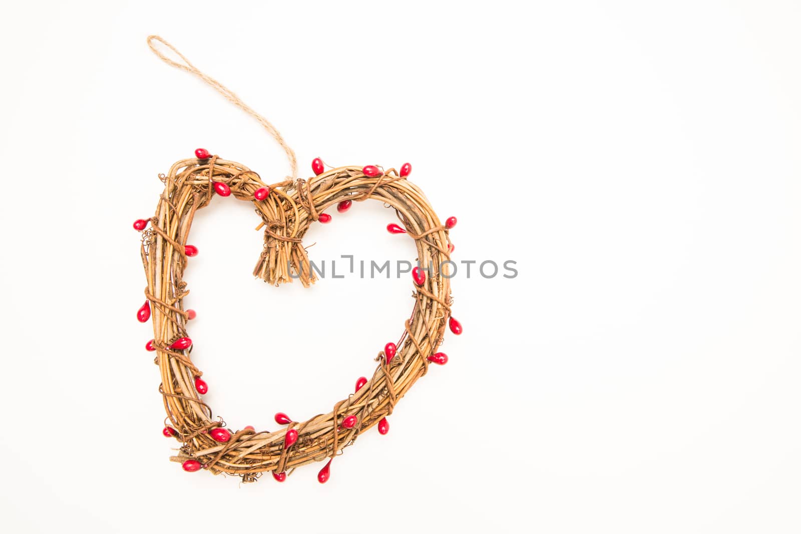 Straw heart shaped wreath by Wavebreakmedia