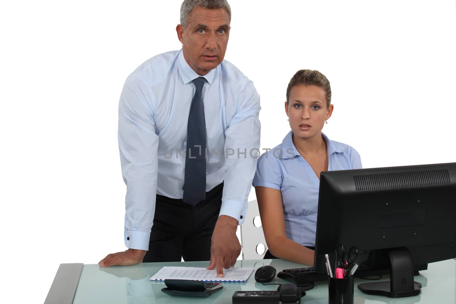 Businessman posing with his secretary by phovoir
