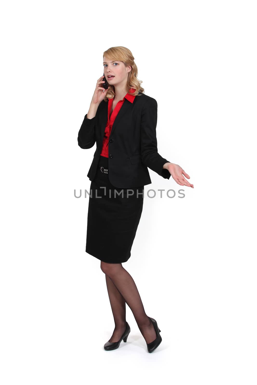 businesswoman talking on her cell by phovoir