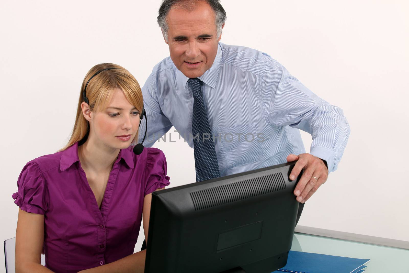 Woman and her boss at a computer