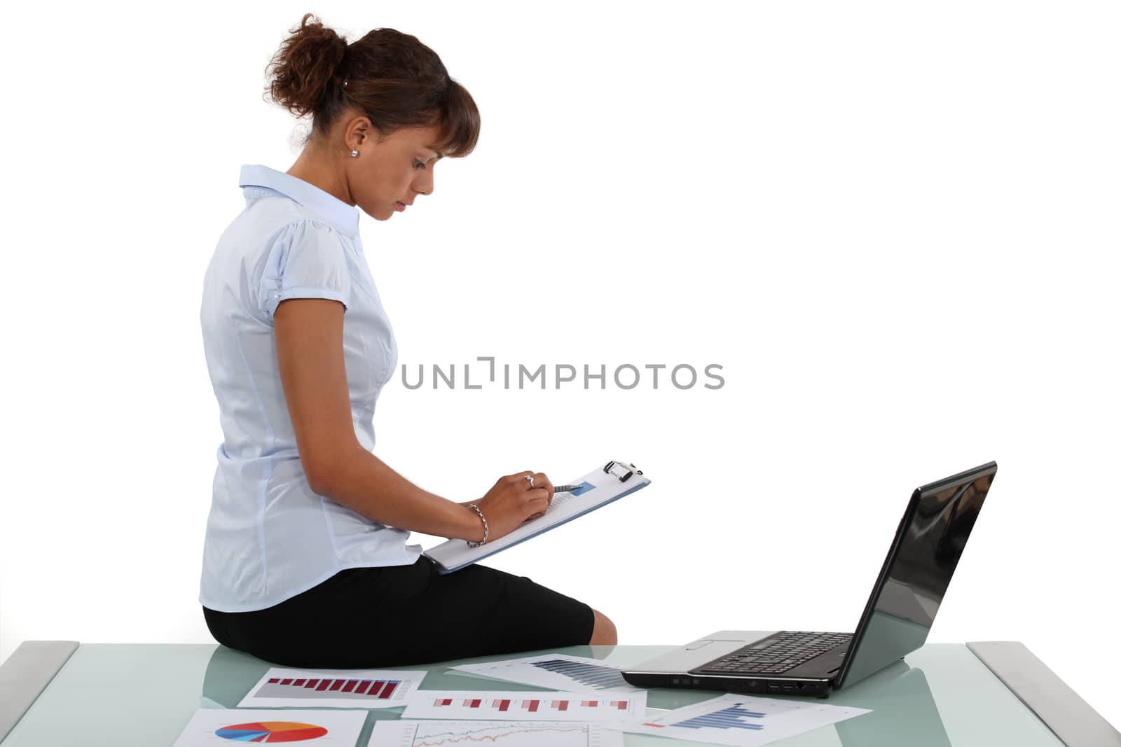 Woman checking financial records by phovoir