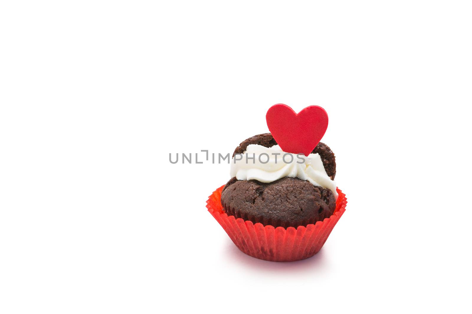 Chocolate valentines cupcake on white background