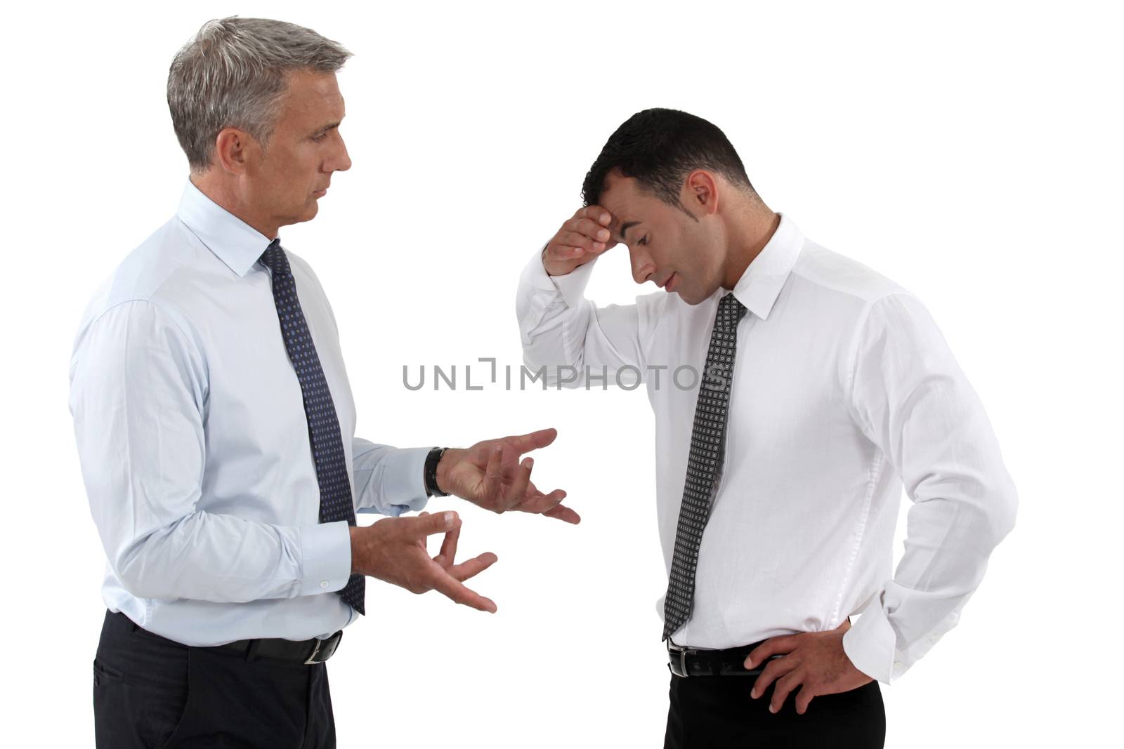 Businessmen quarreling by phovoir