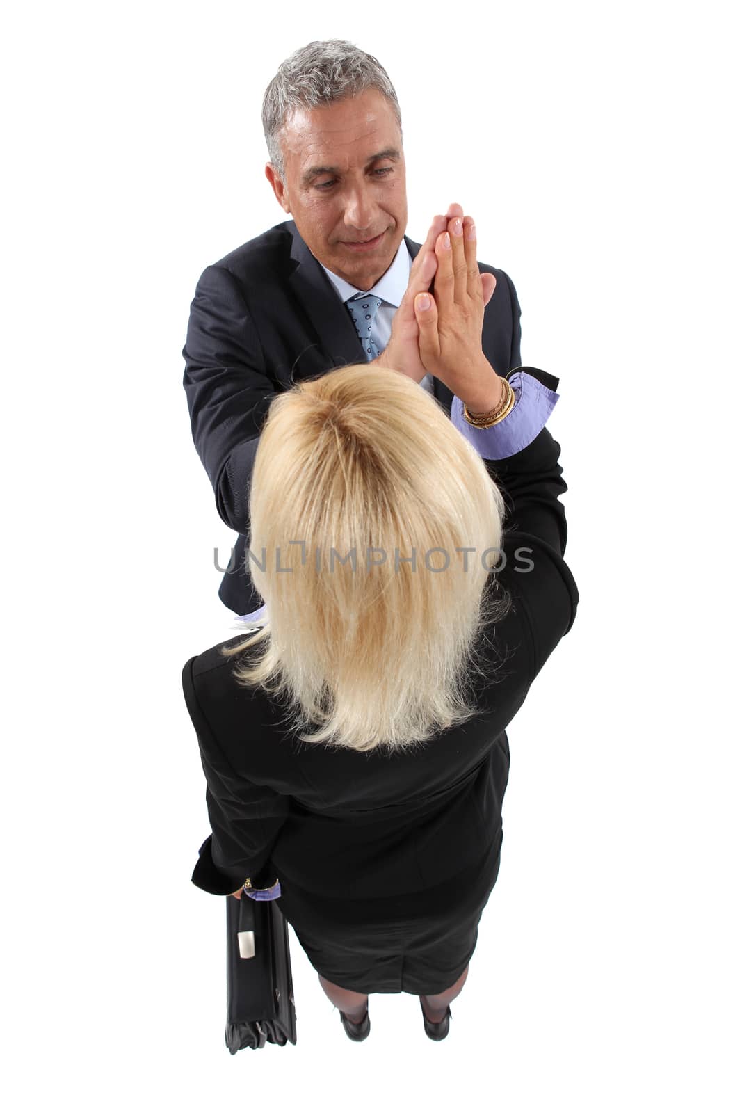 Business partners giving each other a high-five