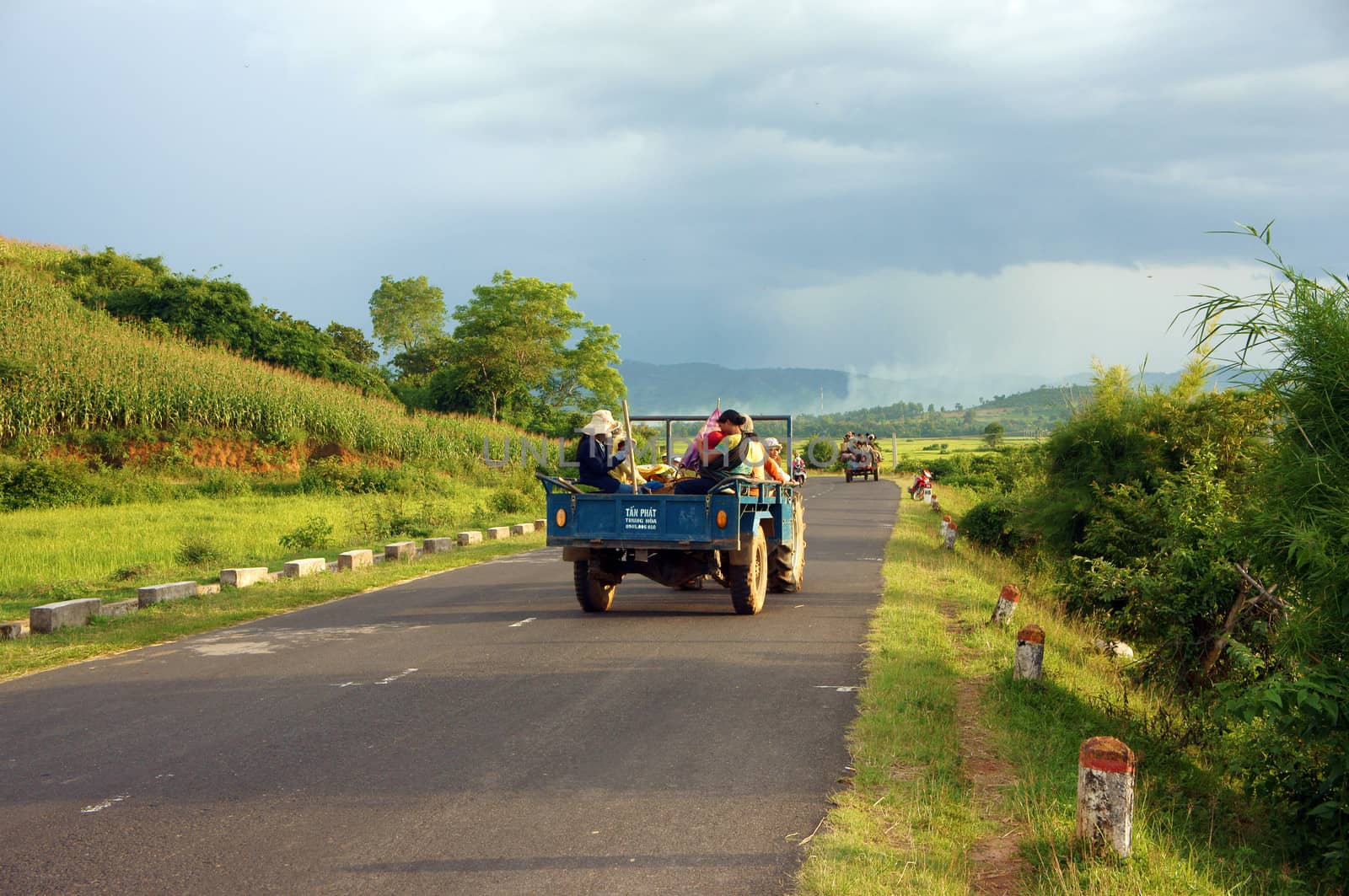 Cong Nong is one of farm vehicle of ethinic minority, after working day, all of them carry to go home by Cong Nong. Daklak, Viet Nam- September 02, 2013