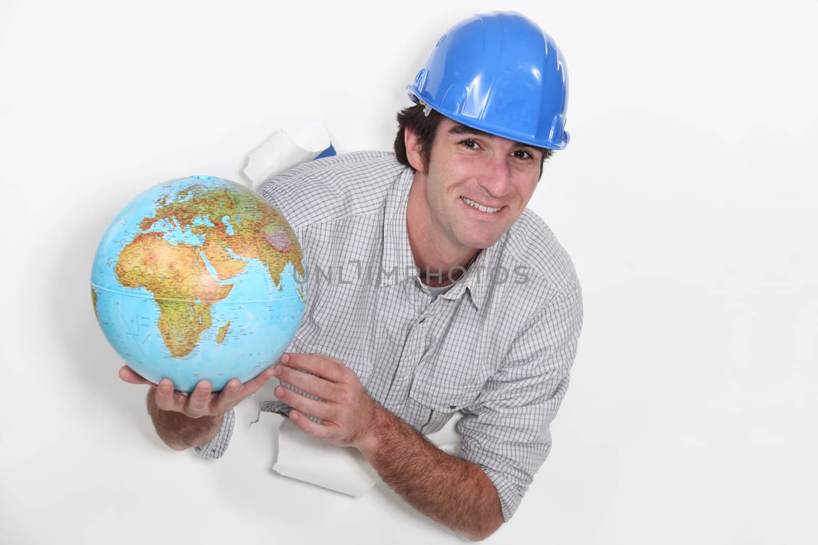 Tradesman holding a globe by phovoir