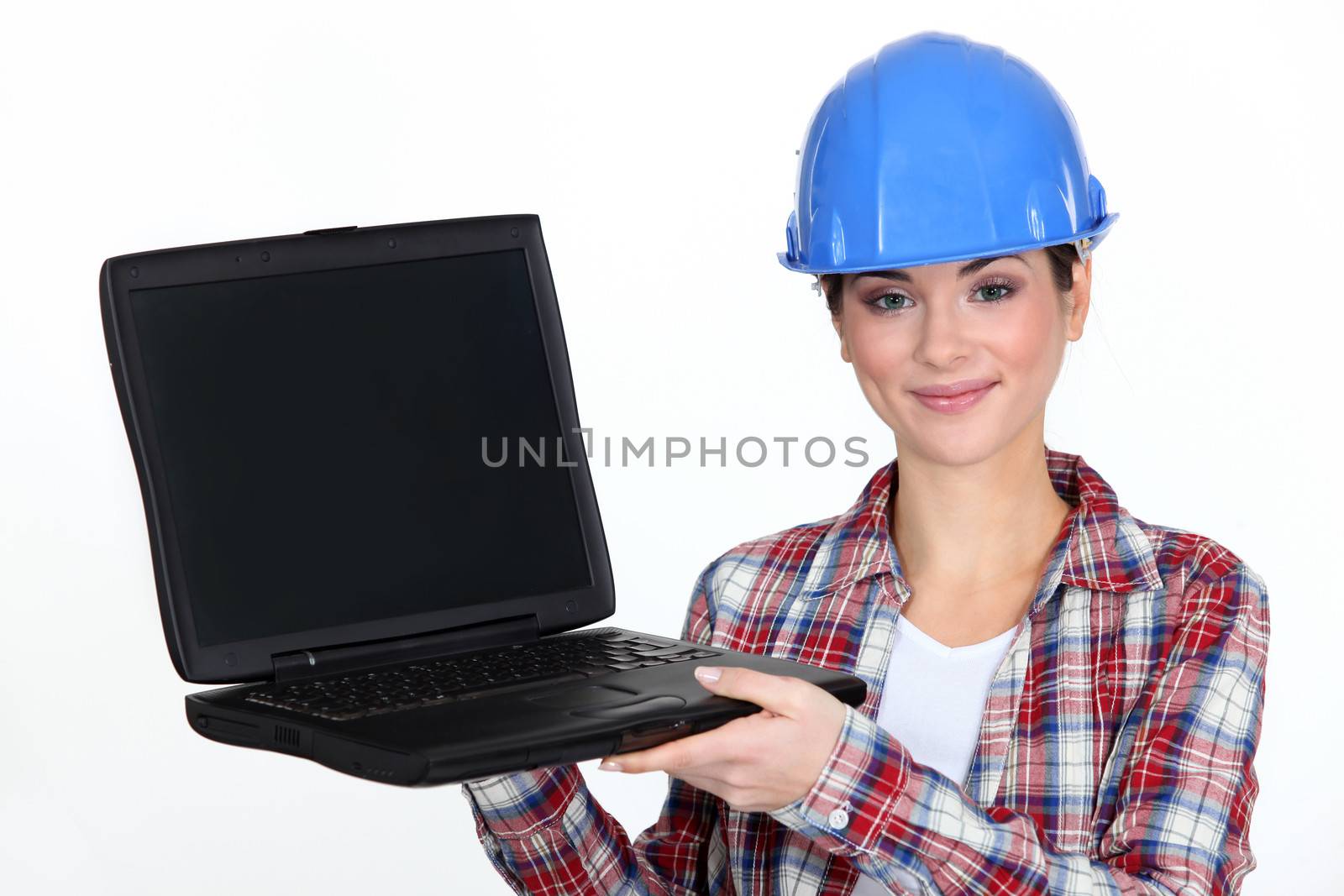 Female contractor holding laptop