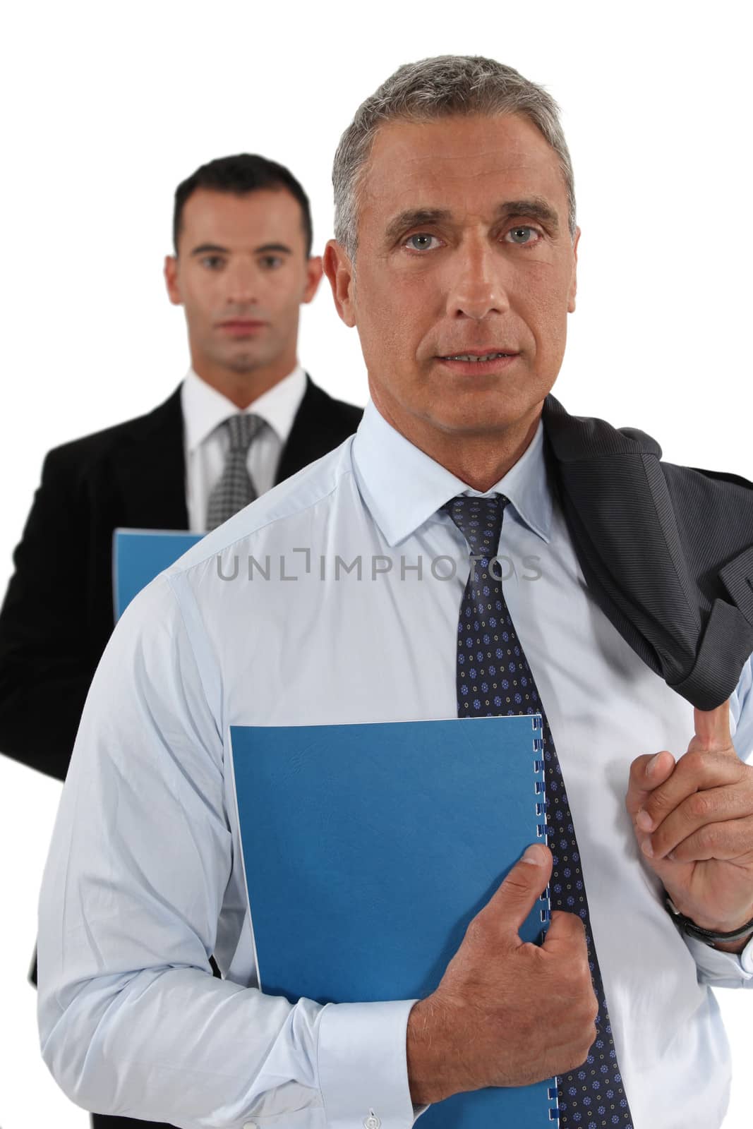 Businessmen carrying reports