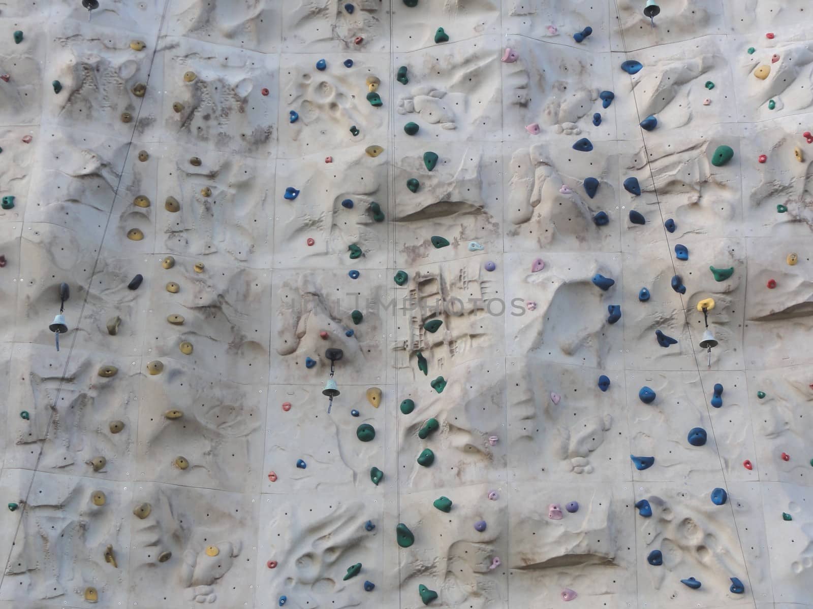 Close up photo of a rock climbing wall