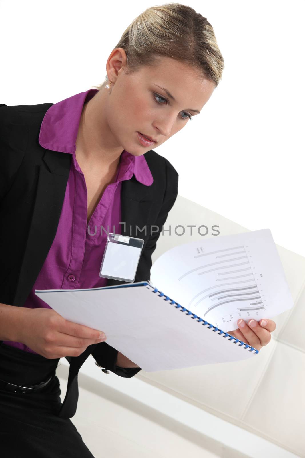 Shocked woman reading document