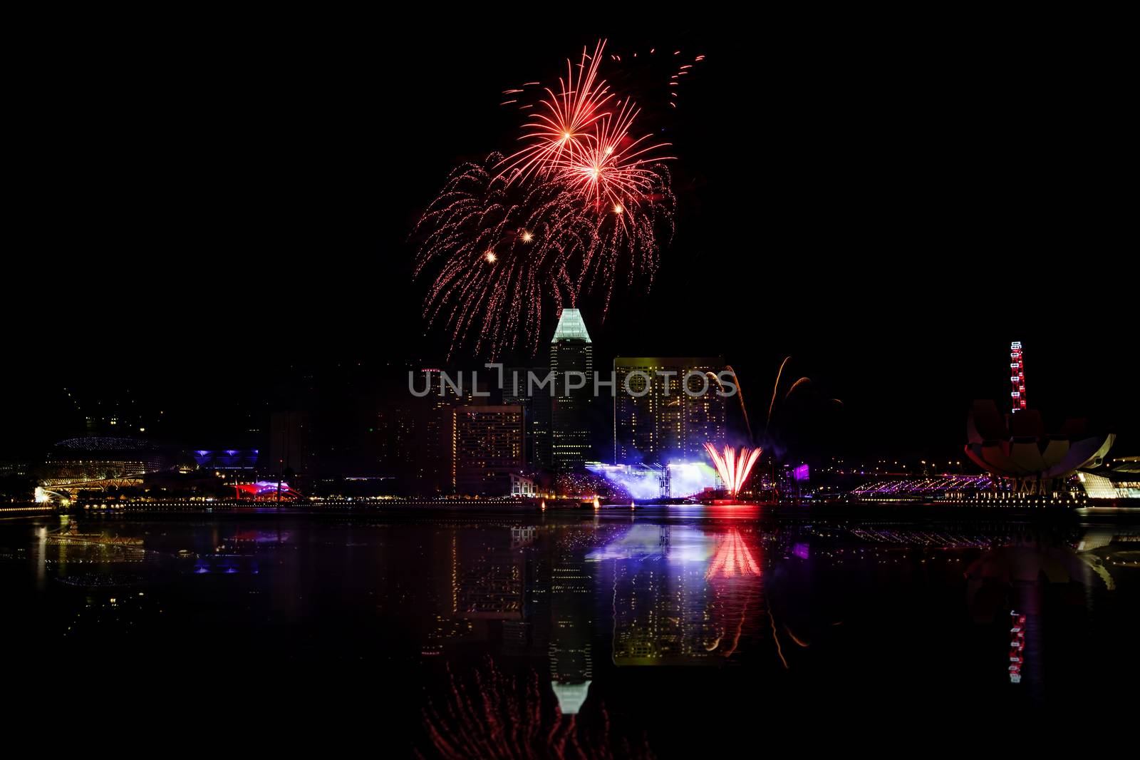 Fireworks over Marina bay in Singapore on National day rehersal