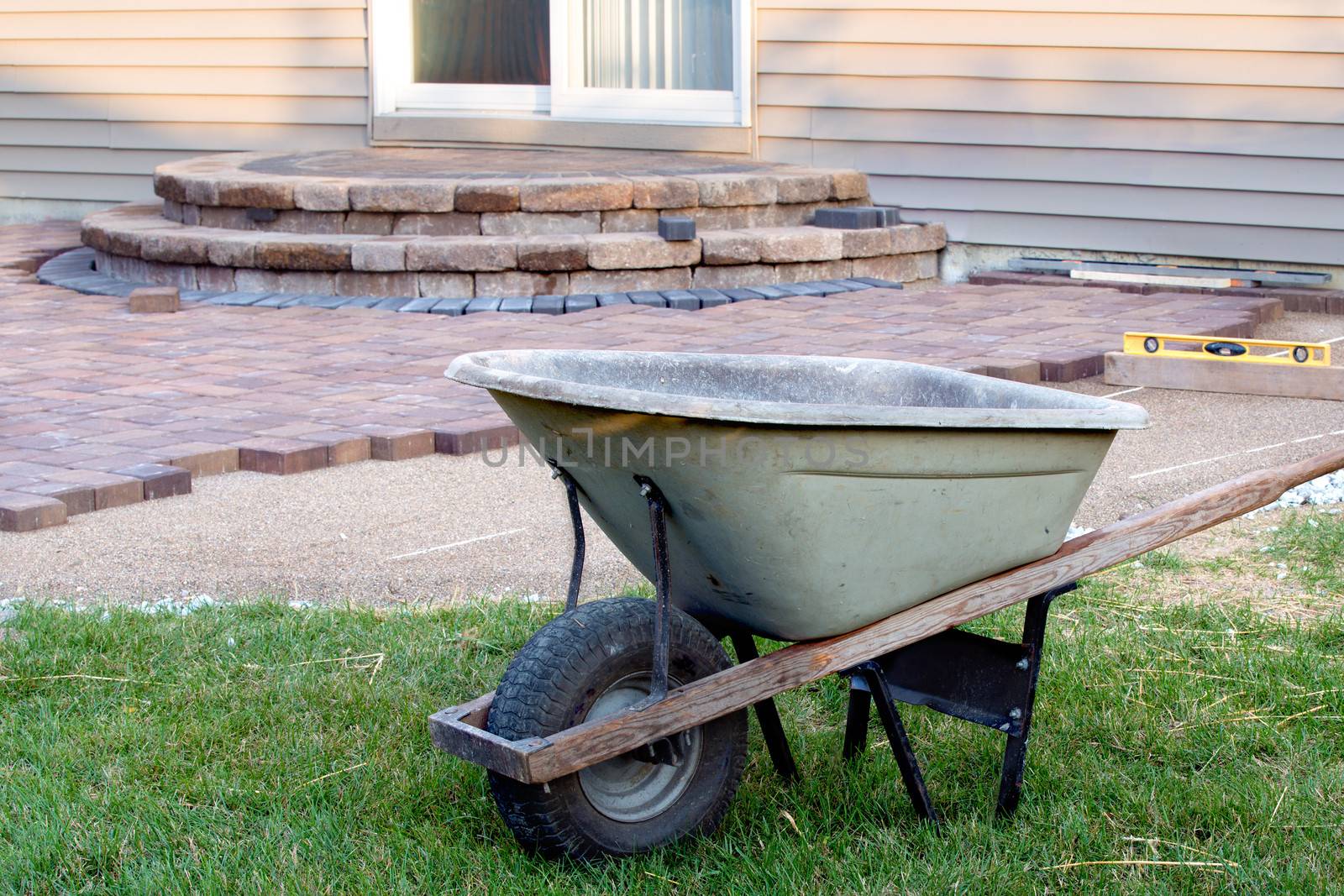 Clean Patio Building with Barrel and Tools by coskun