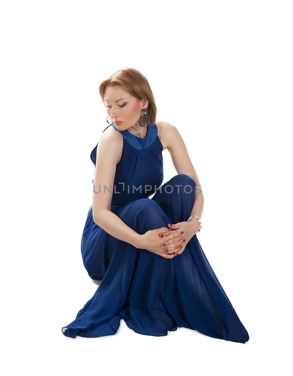 sexy woman in a long dress with bare hands