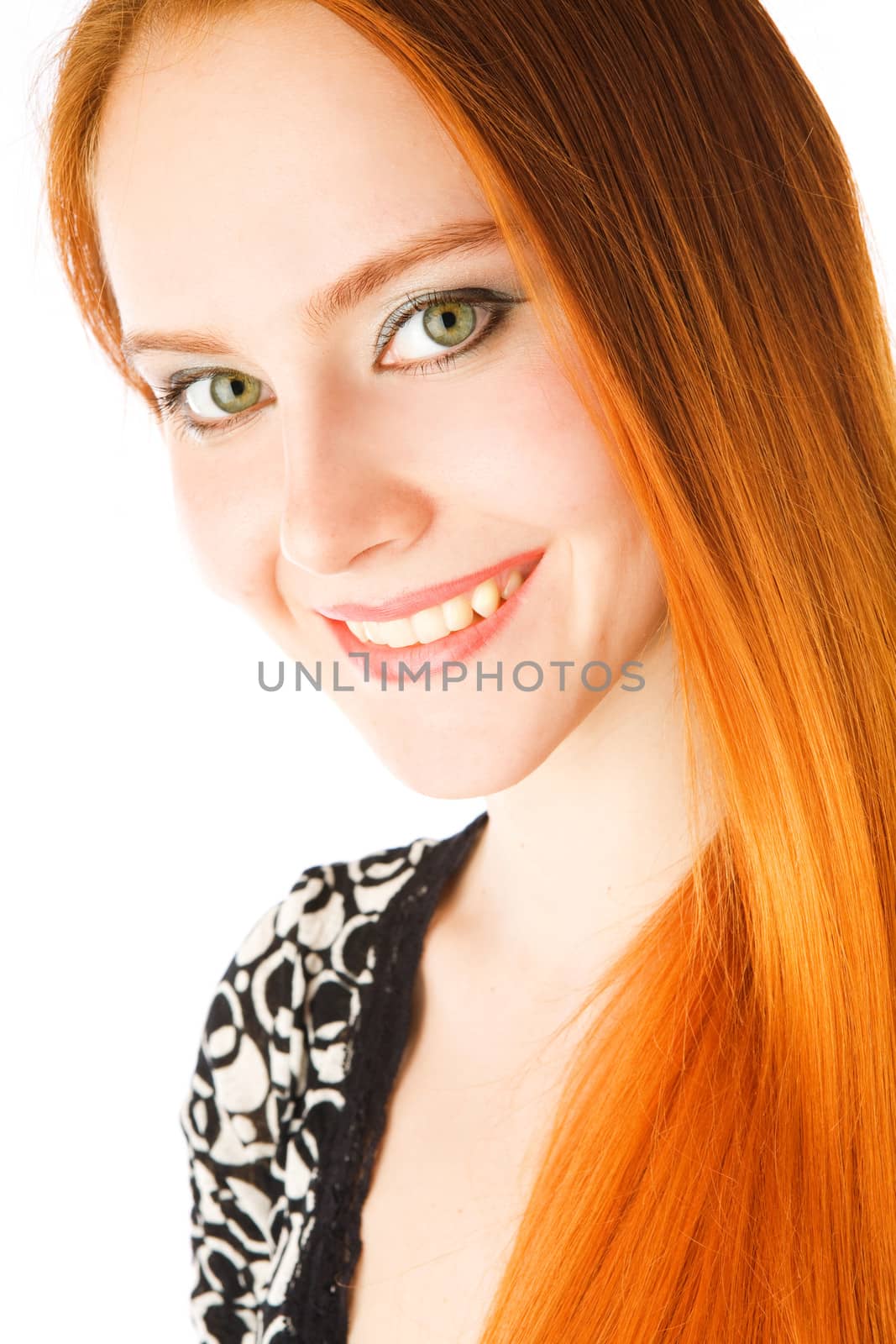 portrait of the girl with long red hair