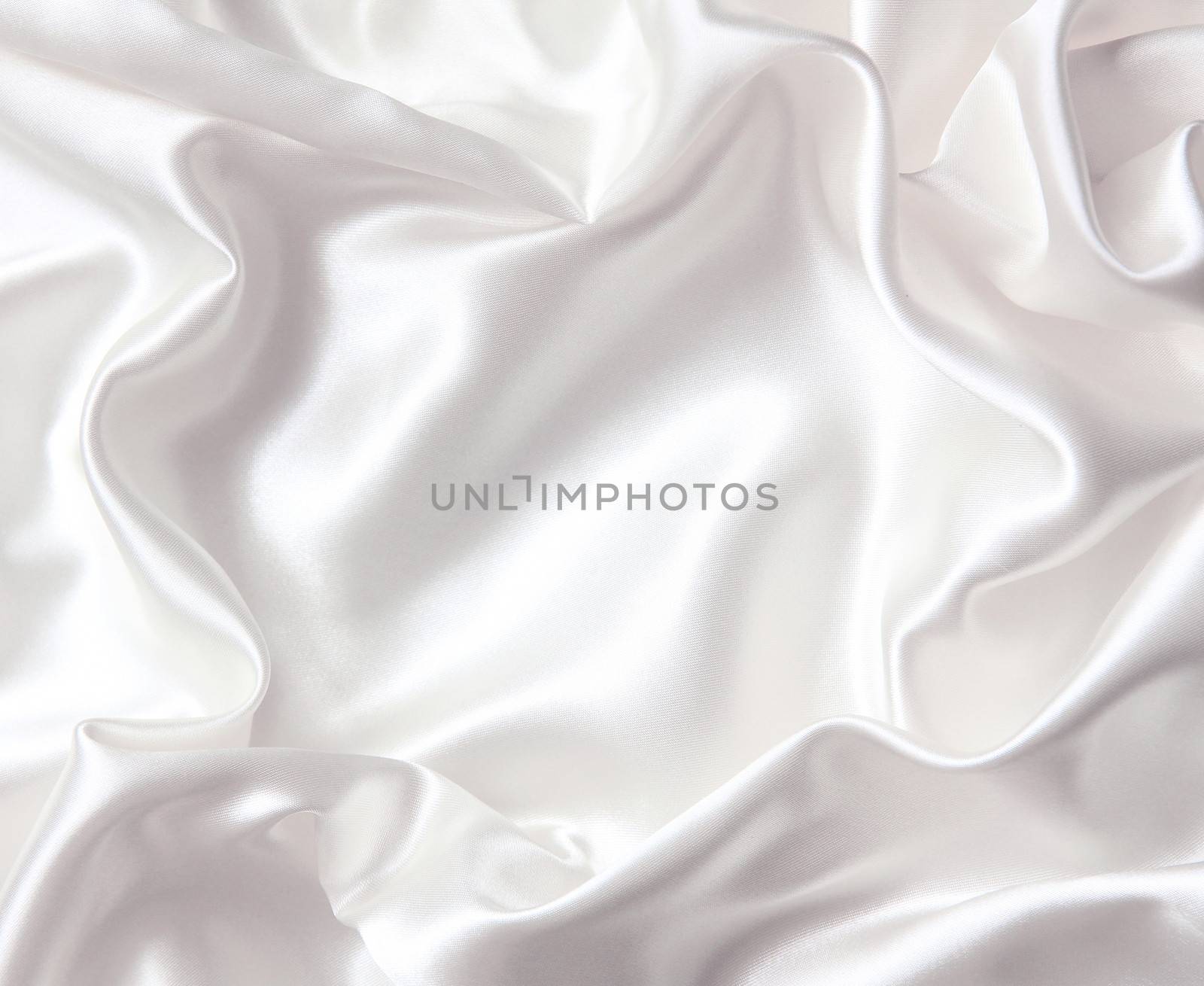 Smooth elegant white silk can use as wedding background 