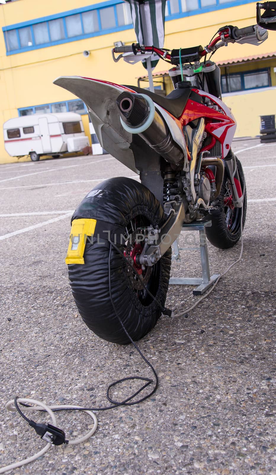 Electric blanket to preheat the rubber at an optimal temperature before going out on the track.