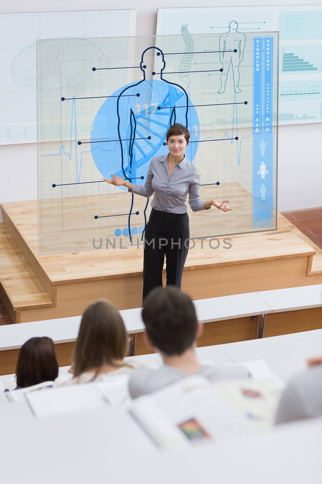 Standing teacher in front of futuristic interface asking a question to students