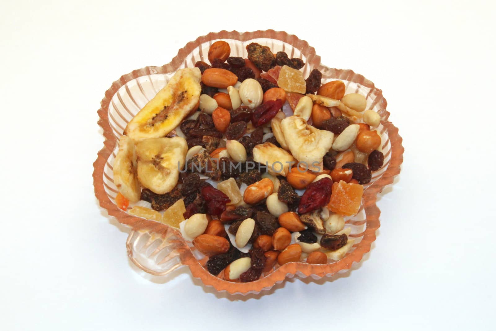 Close up of mixed dried fruit in a dish.