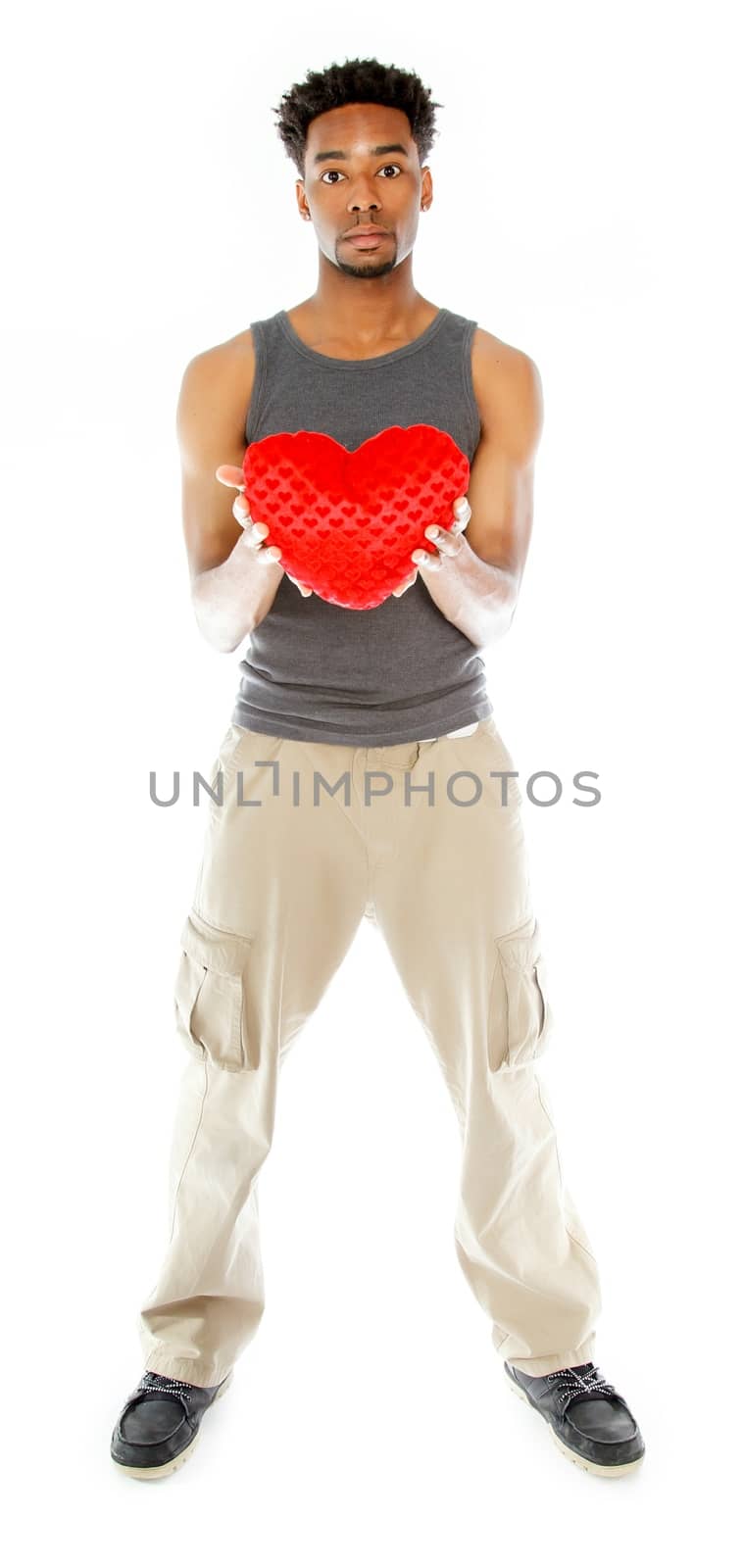 Attractive afro-american man posing in studio by shipfactory
