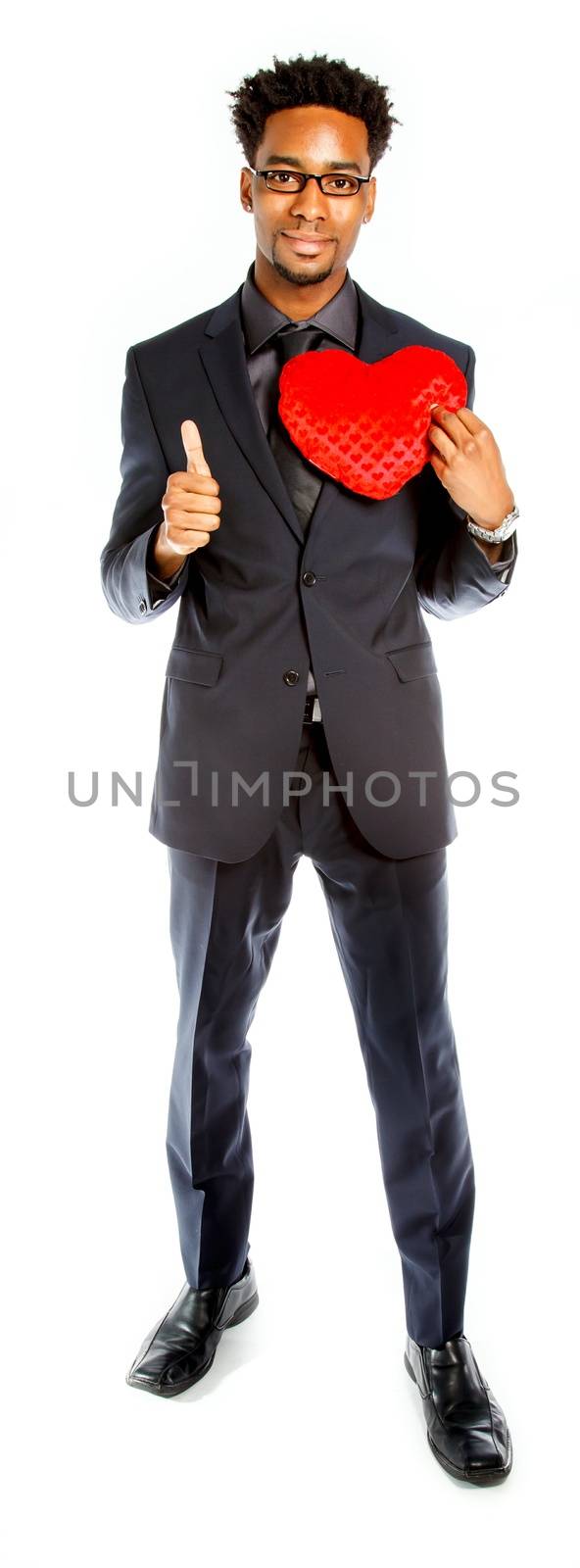 Attractive afro-american business man posing in studio isolated on a white background