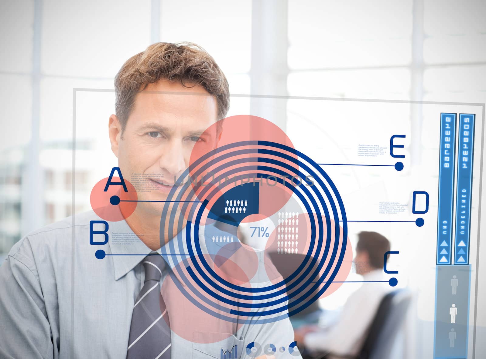 Businessman looking at blue diagram interface with colleague behind him