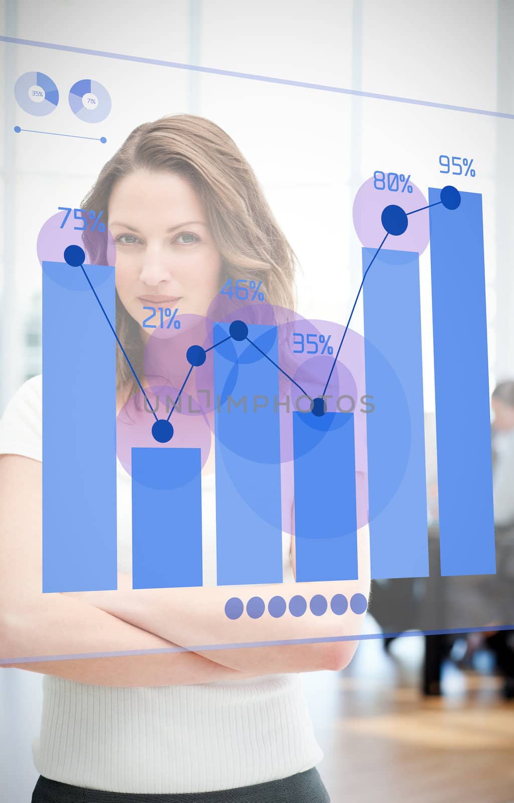 Confident businesswoman looking at blue diagram interface by Wavebreakmedia