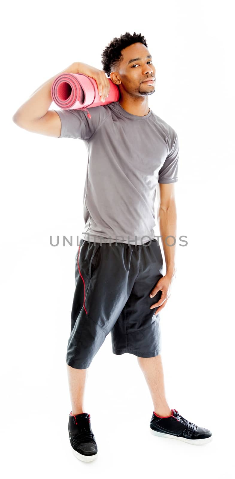 Attractive afro-american man posing in a  studio isolated on a background