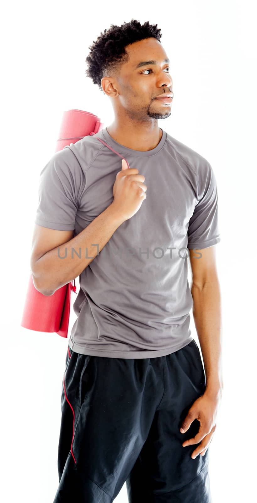 Attractive afro-american man posing in studio by shipfactory