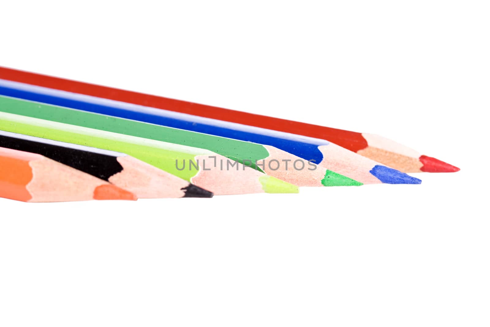 Sharpened colored pencils isolated on white background