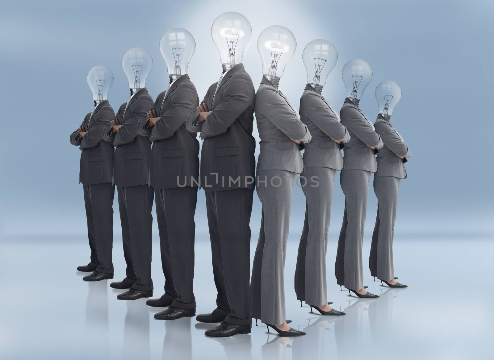 Businessman and businesswoman with light bulb heads multiplied posing on blue background