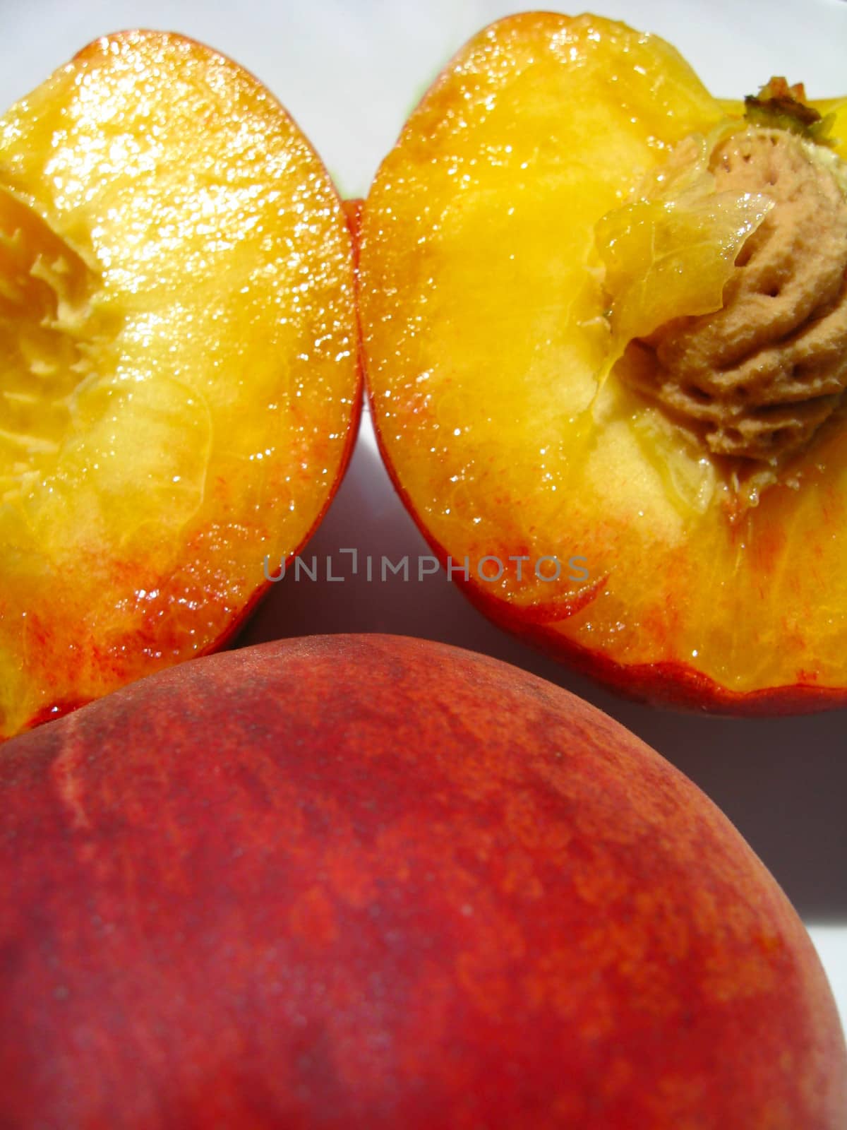 fruit of cut ripe peach by alexmak