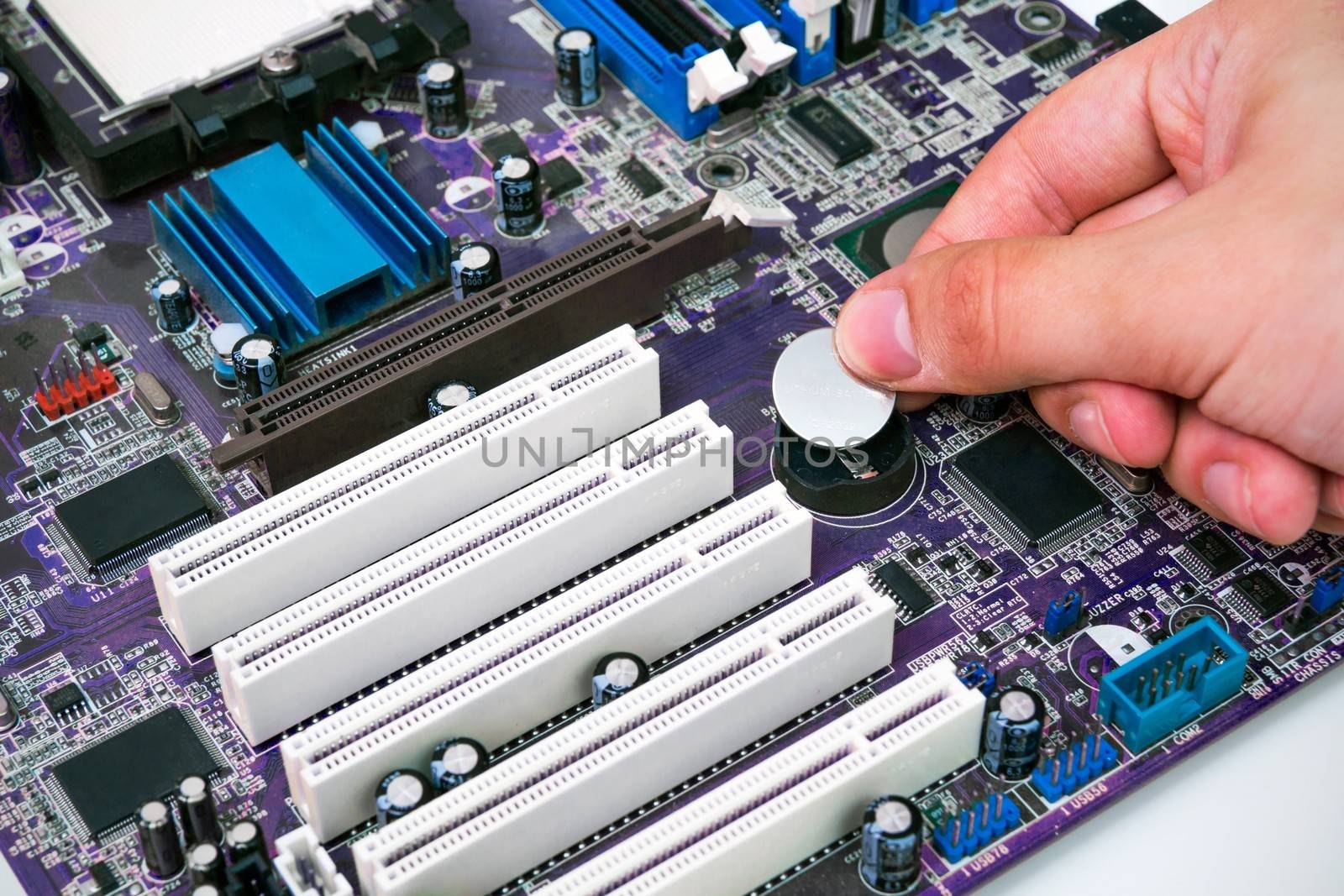 Hand install battery to PC motherboard by simpson33