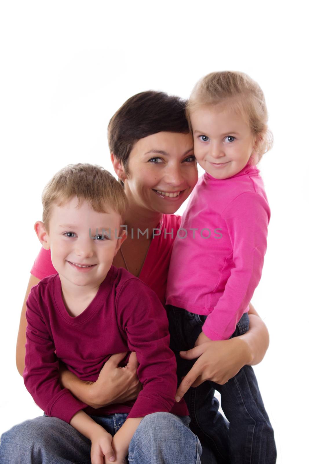 Happy mother and two children isolated on white