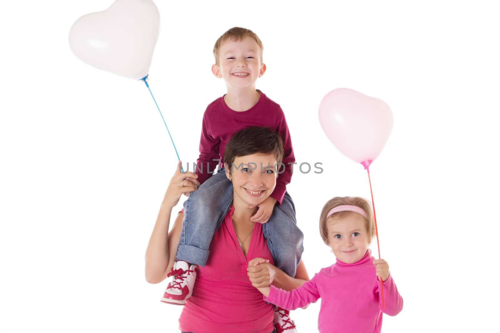 Happy mother and two children with balloons isolated on white